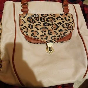 Steve Madden beige and black used.